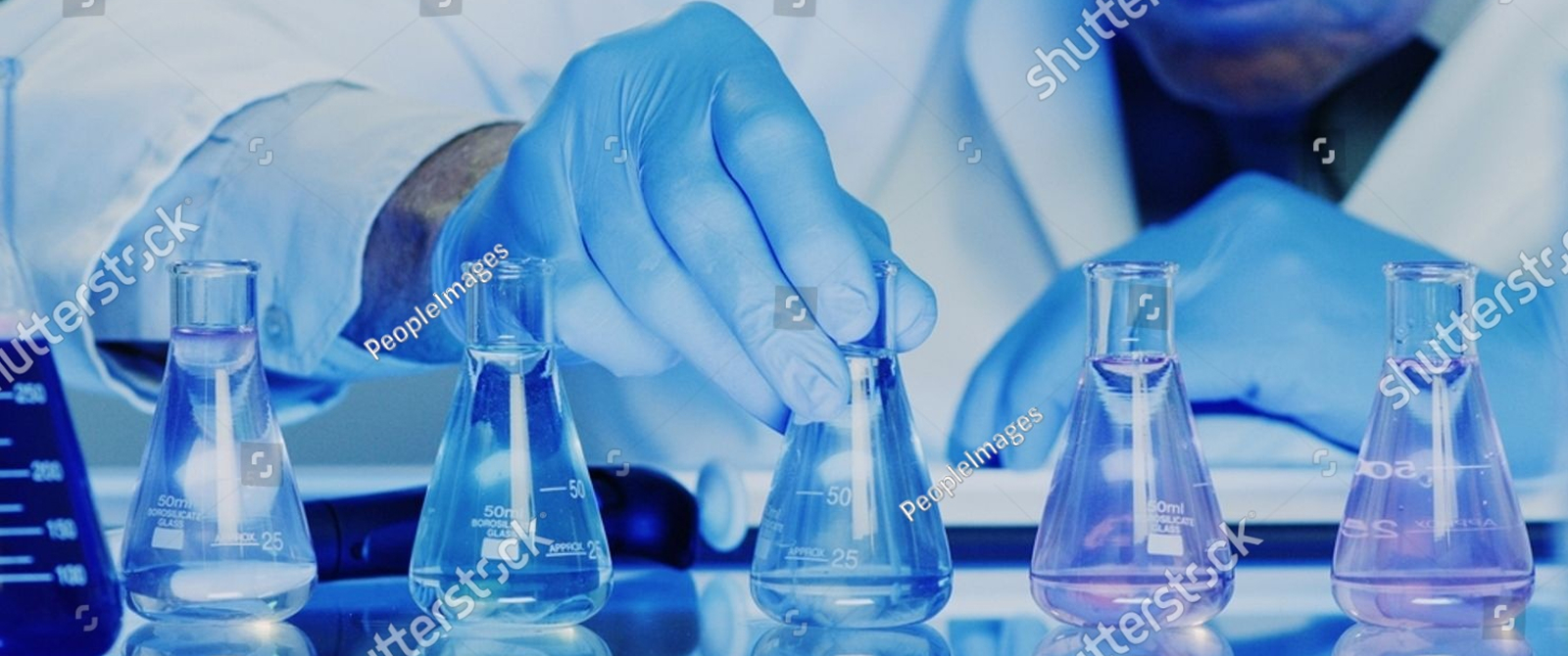 Two pharmaceutical professionals reviewing information on a tablet